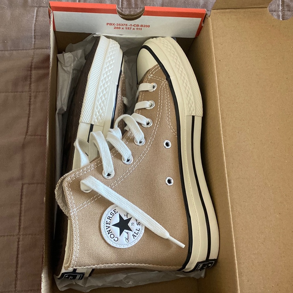 beige/tan high top converse